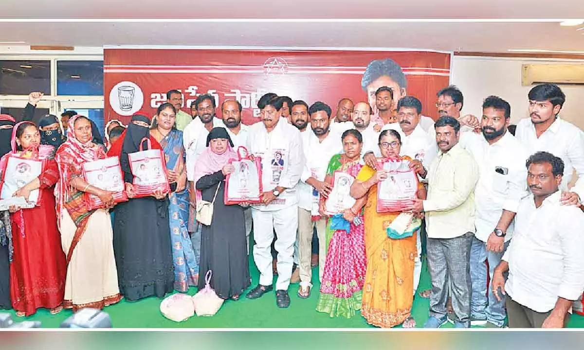 Jana Sena distributes kits with essentials to flood victims