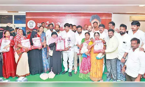 Jana Sena distributes kits with essentials to flood victims