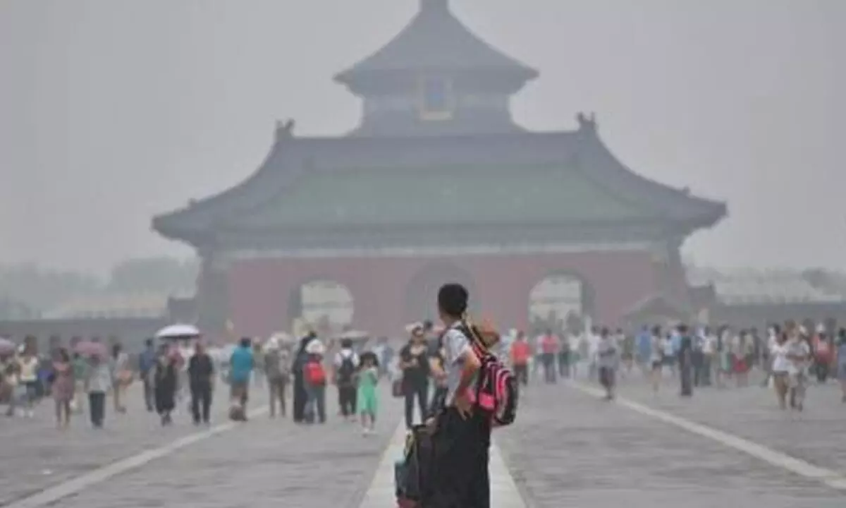 Beijing activates alert for air pollution