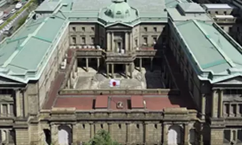 Japan holds policy rate steady, highlights caution