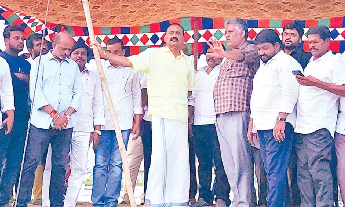 YSRCP State general secretary Chevireddy Bhaskar Reddy showing the public meeting site to Bhumana Karunakar Reddy in Tirupati on Friday