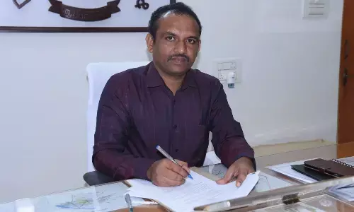 NSK Khajavali taking charge as Guntur district revenue officer in Guntur on Friday