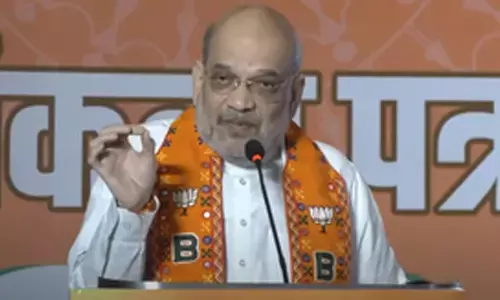 HM Shah unveils BJPs Sankalp Patra for Jkhand; prioritises Roti, Maati, Beti