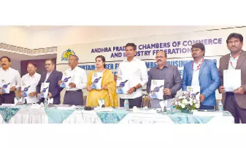 Minister for MSMEs Kondapalli Srinivas and CEO of AP MSME Development Corporation Nandani Salaria releasing a brochure along with AP Chamber of Commerce president Potluri Bhaskara Rao and other members for AP Chambers Business EXPO-2024 to be held this month-end in Vijayawada on Tuesday Photo: Ch Venkata Mastan
