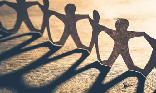 Human chain by CNC to protest land reforms in Buttanagal