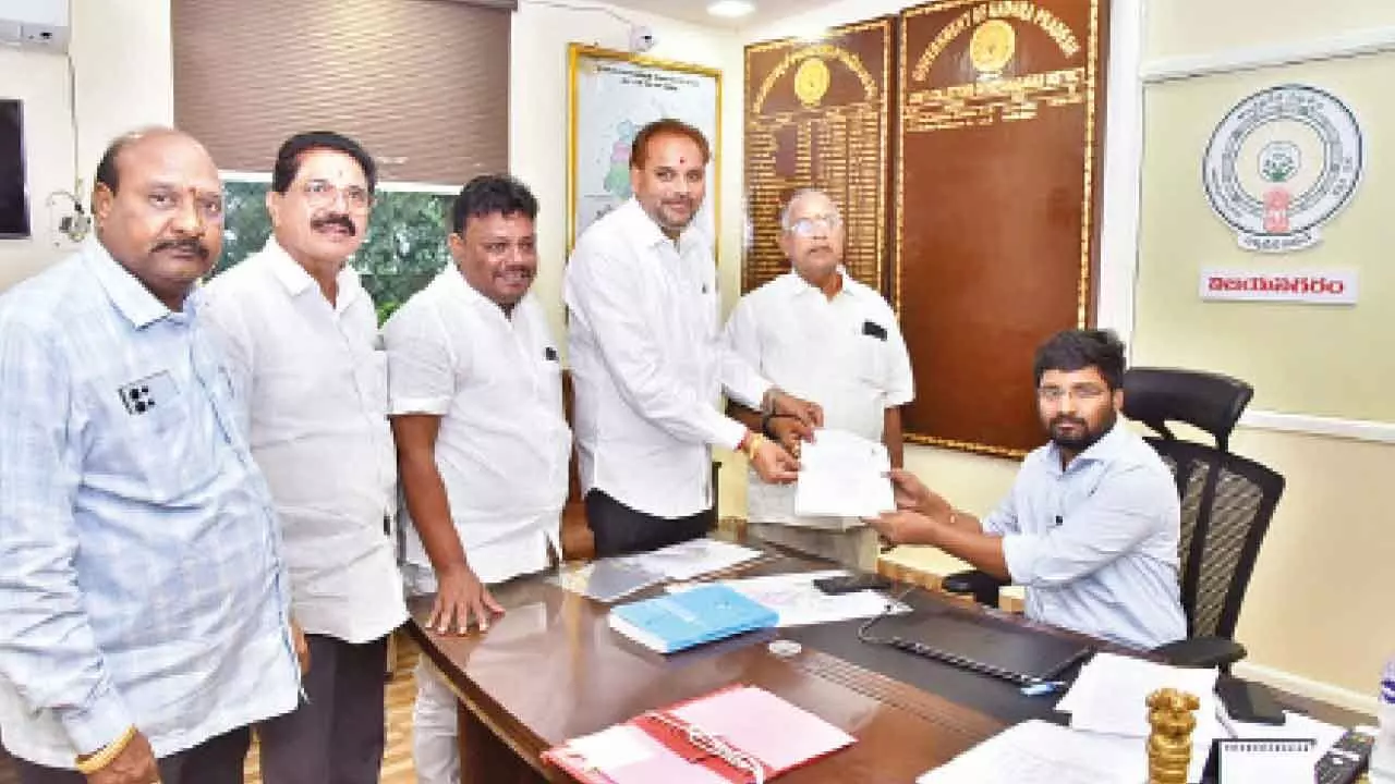 YSRCP candidate S V Ch Appala Naidu filing nomination  papers with returning officer Setu Madhavan in Vizianagaram on Thursday