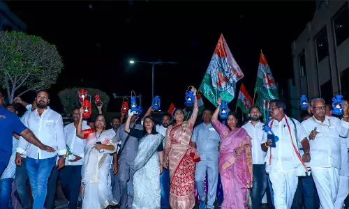 Congress leaders led by APCC chief Y S Sharmila taking out a protest rally holding lanterns against increase in power tariff  in Vijayawada on Thursday