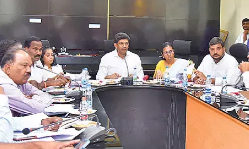Union Minister of State for Rural Development and Communications Dr Pemmasani Chandra Sekhar addressing a meeting at the Collectorate in Guntur on Friday