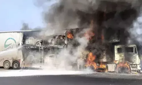 Container carrying cars catches fire on Hyd-Mumbai highway