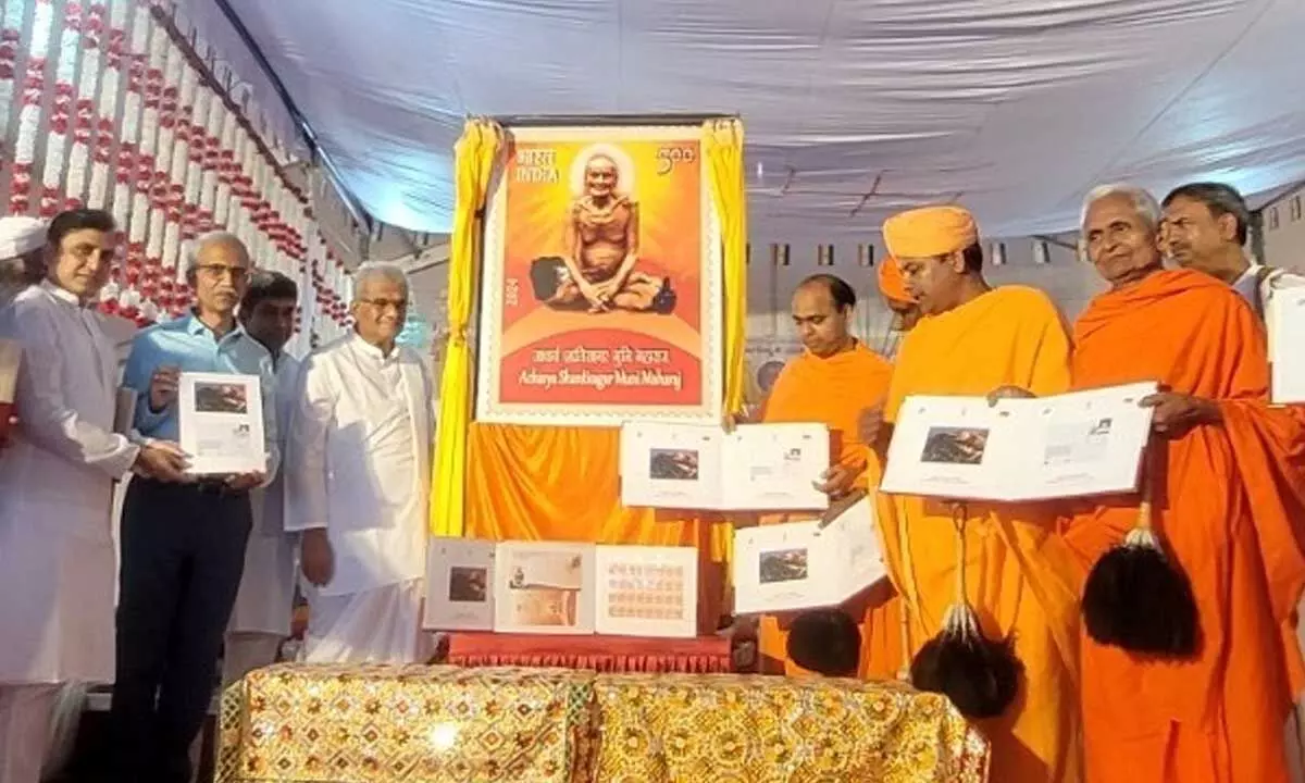 Stamp on Jain Muni Released in Hombuja Jain temple in Shivamogga