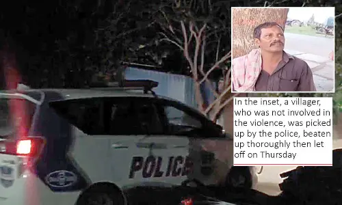 Cops in vehicle entering Legacharla village in Kodangal district in the dark of the night to arrest villagers for violence