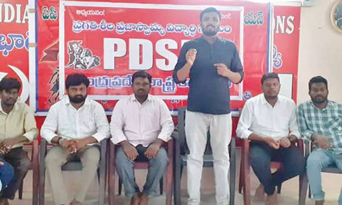 PDSU State president Bhushanam speaking at a meeting in Tirupati on Friday