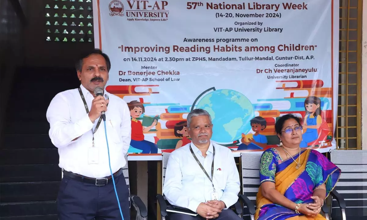 VIT-AP University librarian Dr Veeranjaneyulu, Dean Dr Banerjee Ch and Mandadam High School Headmistress Jhansi at the National Library Week celebrations at the High School at Mandadam