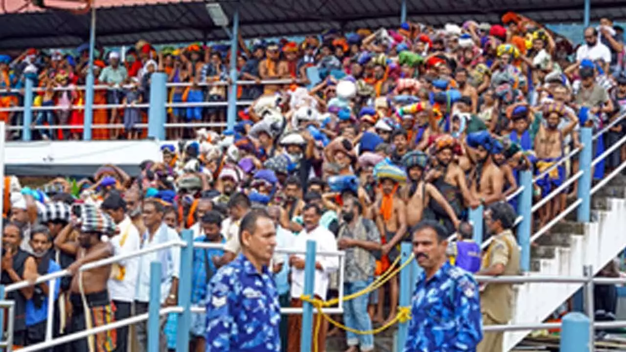 Pilgrims throng Sabarimala temple on opening day of long festive season