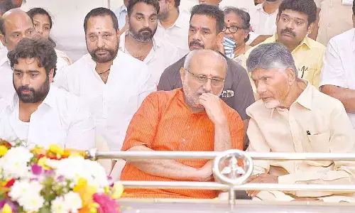 Maharashtra Governor C P Radhakrishnan with Chief Minister N Chandrababu Naidu after paying last respects to Ramamurthy Naidu at Naravaripalli on Sunday