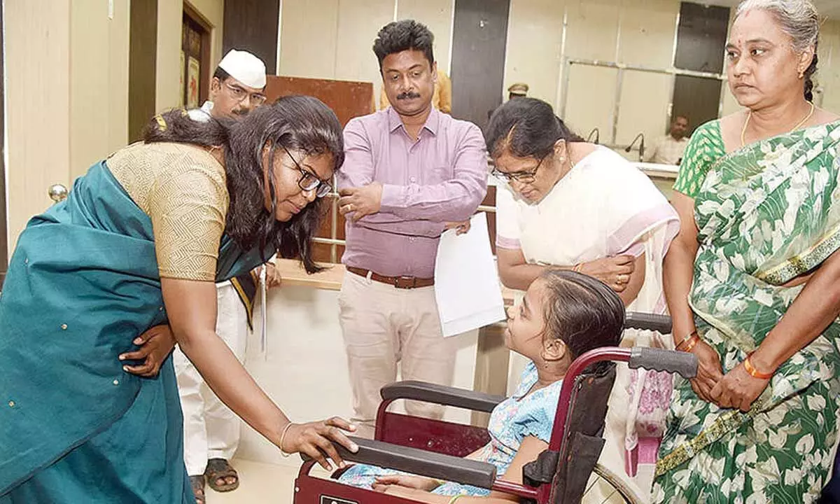 Physically-challenged girl receives wheelchair