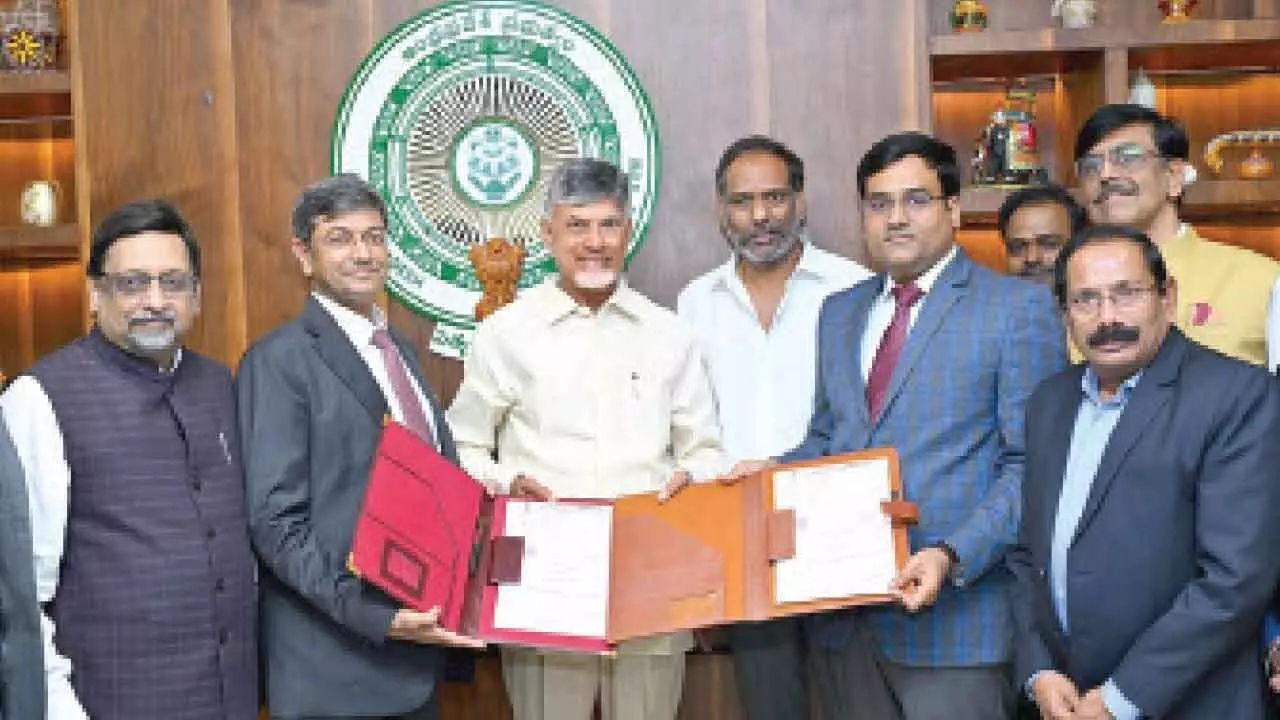 NTPC Green and NREDCAP officials exchange copies of agreement in the presence of Chief Minister N Chandrababu Naidu and energy minister G Ravi Kumar at the Secretariat on Thursday