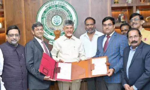 NTPC Green and NREDCAP officials exchange copies of agreement in the presence of Chief Minister N Chandrababu Naidu and energy minister G Ravi Kumar at the Secretariat on Thursday