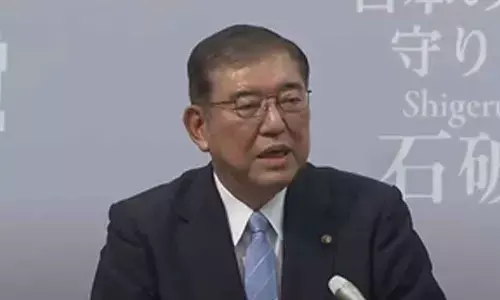 Japanese government approves 250-billion USD economic package to ease price pain