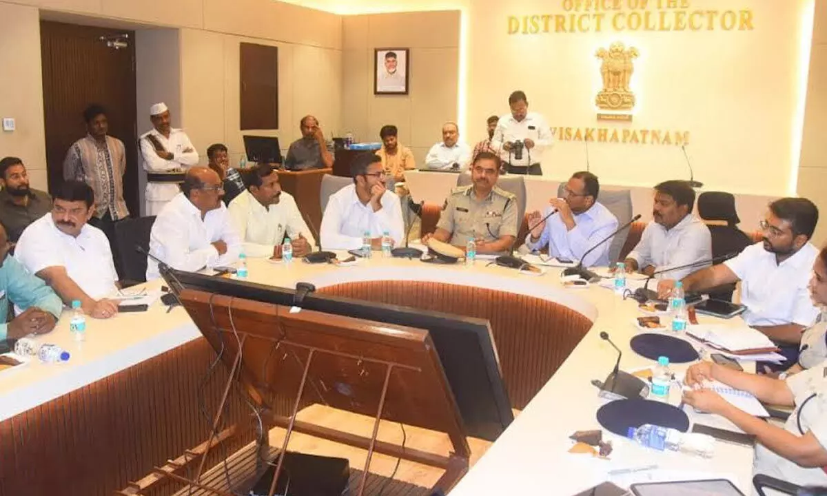 District Collector M N Harendhira Prasad, along with others participating in a meeting in Visakhapatnam on Sunday ahead of the PM’s visit