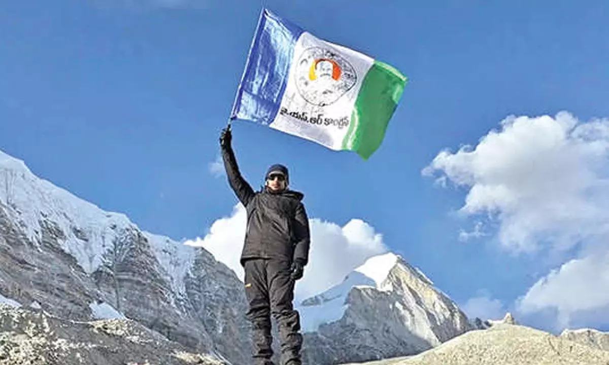 Bhumana Abhinay hoists YSRCP flag at Everest base camp