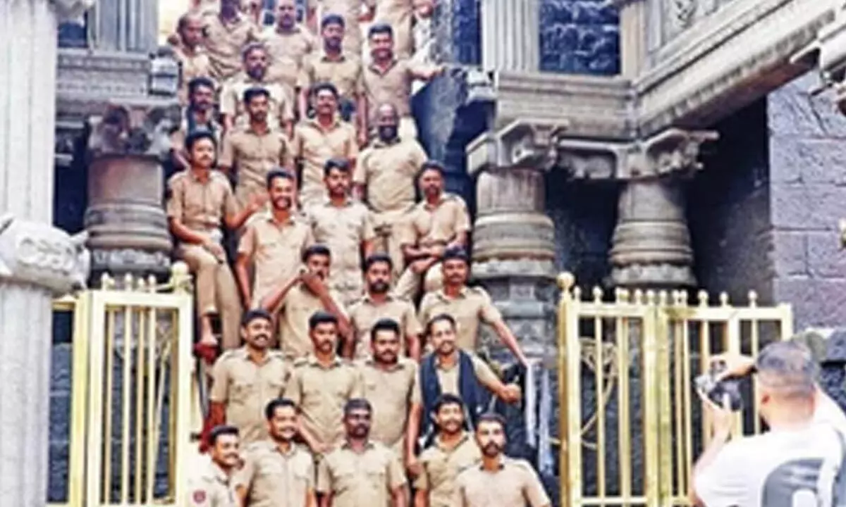 Photo of cops violating Sabarimala temple traditions goes viral; report sought