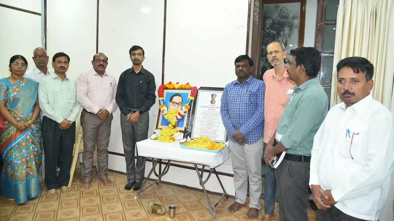 District Collector Vinod Kumar garlanding the portrait of the architect of the Constitution  Dr B R Ambedkar in Anantapur on Tuesday