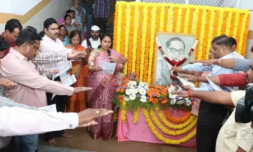 Municipal Commissioner Narapureddy Mourya administering oath to the staff on the occasion of the Constitution Day on Tuesday