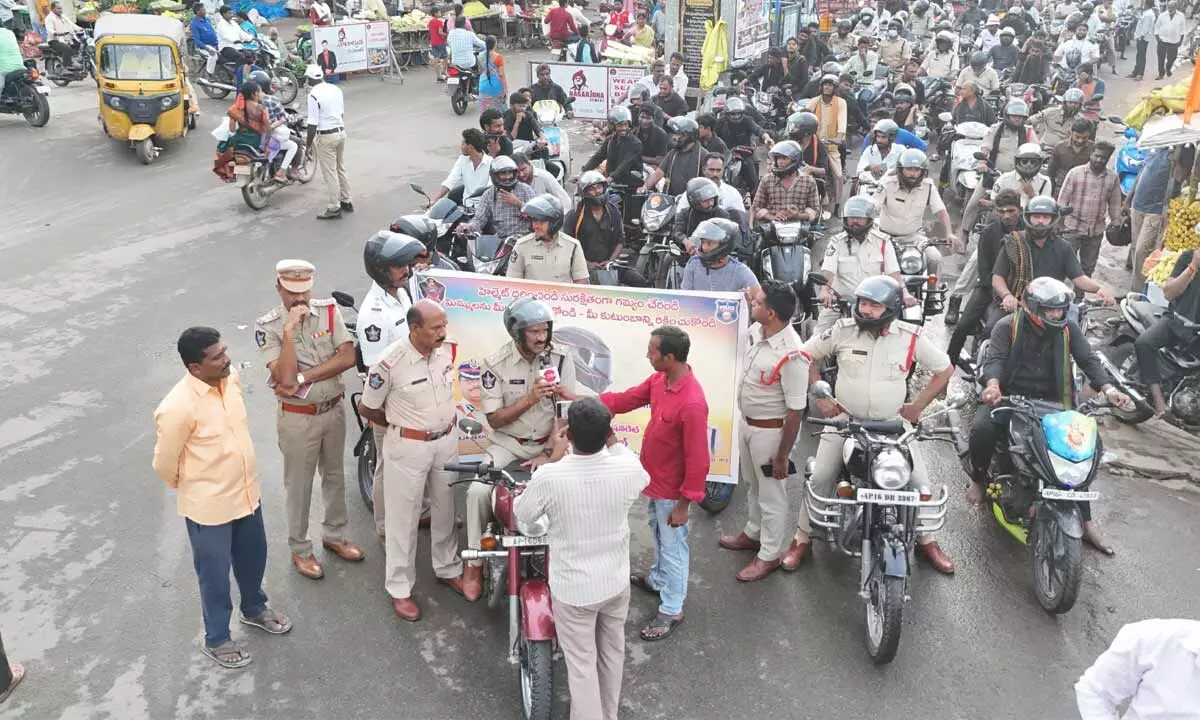 Police taking out a bike rally in Jaggayyapet on Sunday