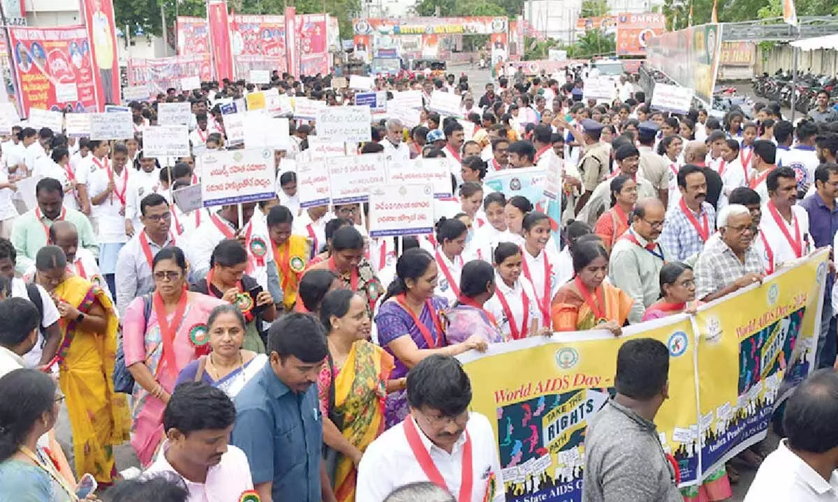 Students and NGOs taking part in an AIDS awareness rally organised by AP State AIDS Control society in Vijayawada on Sunday Photo: Ch Venkata Mastan