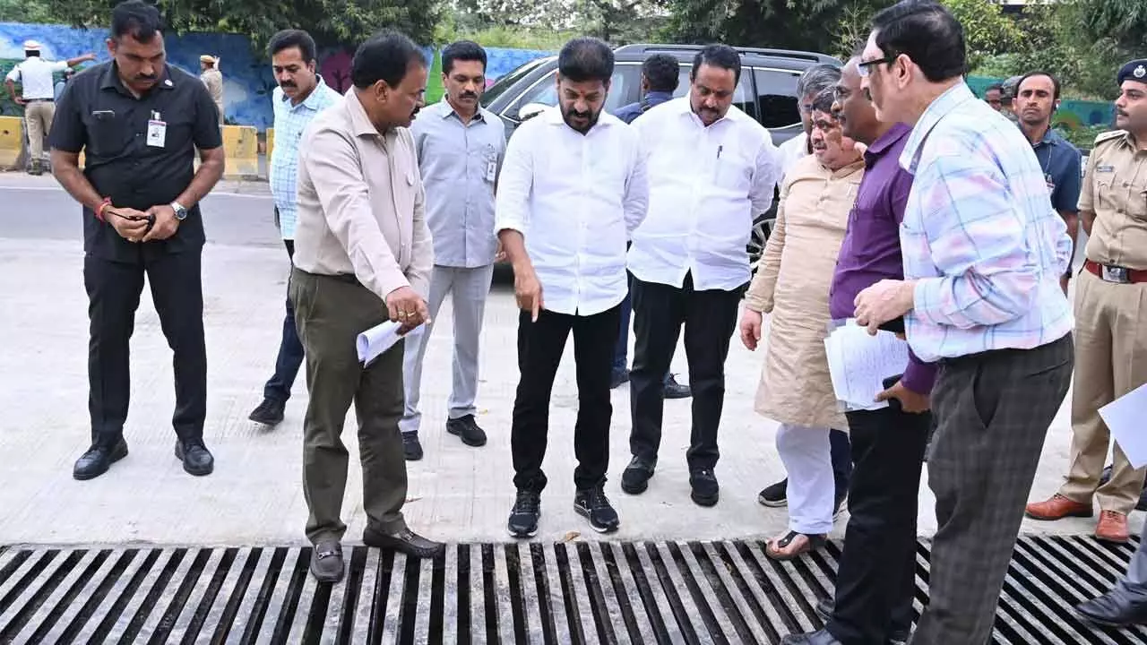 CM Revanth inspects rainwater sump works at Lake View guest house