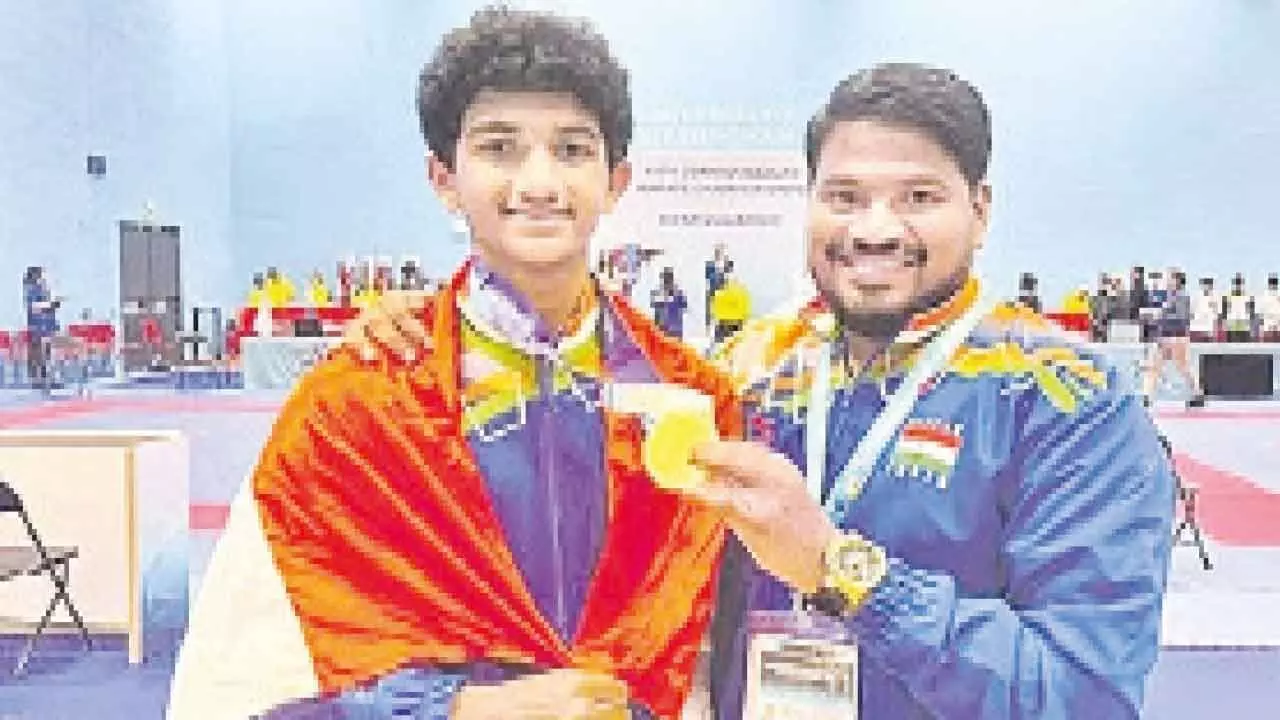 Arabandi Karthik Reddy with head coach of India Keerthan Kondru