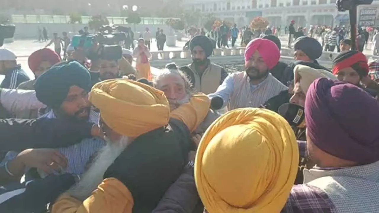 Man tries to shoot Sukhbir Badal at Golden Temple, arrested