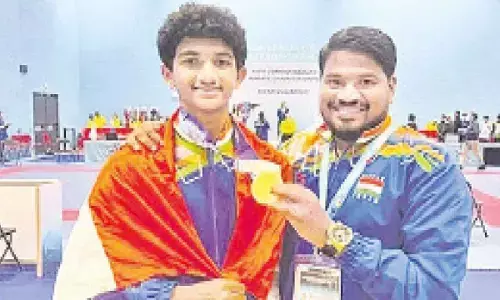 Arabandi Karthik Reddy with head coach of India Keerthan Kondru