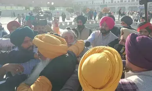 Man tries to shoot Sukhbir Badal at Golden Temple, arrested