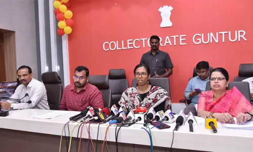 Collector S Nagalakshmi and joint collector A Bhargav Teja addressing the media in Guntur on Thursday