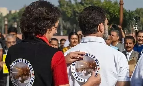 Opposition protests wearing ‘Modi Adani Ek Hai stickers