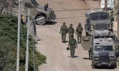 Israeli army calls up extra forces near Syrian border