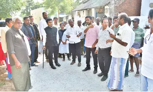 Annamayya District Collector Sridhar Chamakuri inspecting a BT road work in Veeraballe mandal of Rajampet Assembly constituency