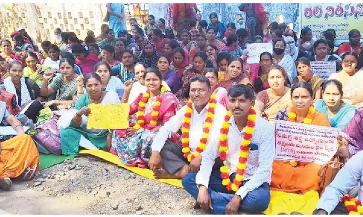 Comprehensive education employees protest for pay scale implementation