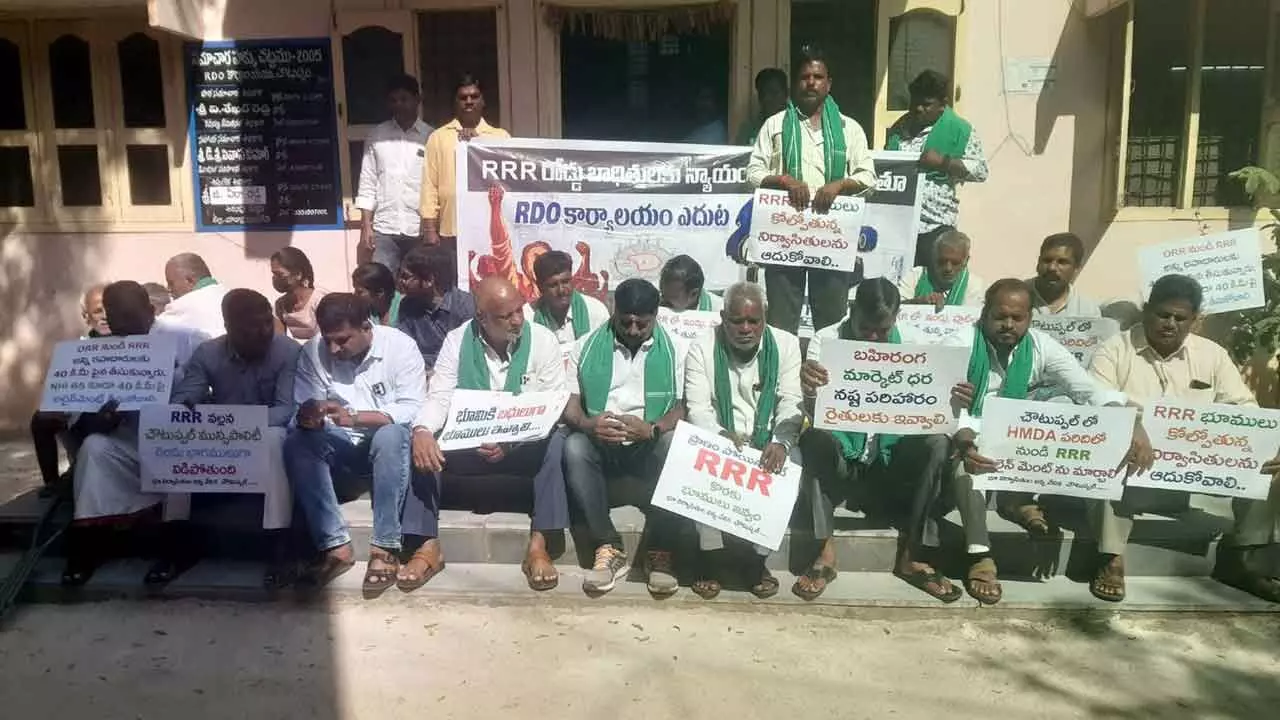 RRR land evictees staging a sit-in protest in front of the RDO office