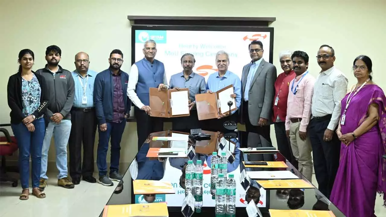 GITAM Professors and Silicon Labs officials exchanging an MoU at the campus in Visakhapatnam on Tuesday