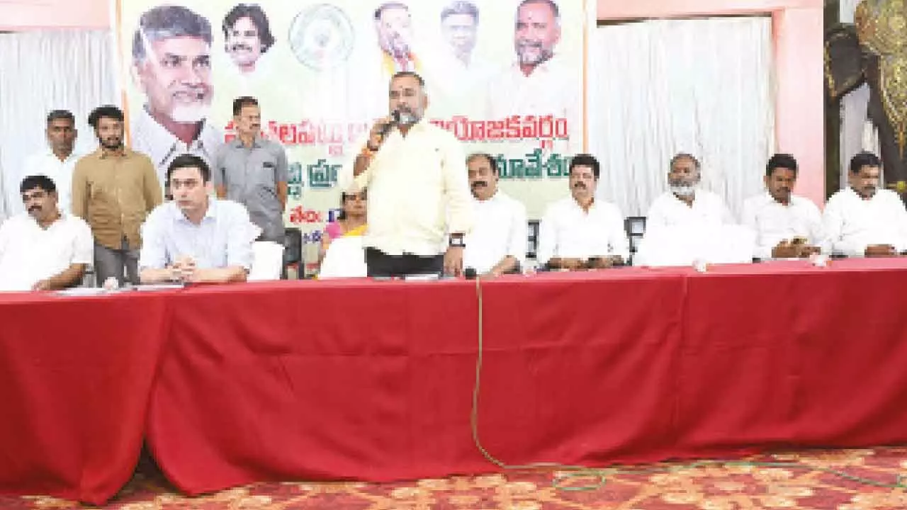 Puthalapattu MLA K Murali Mohan speaking at the constituency review meeting in Ka-nipakam on Tuesday. Collector Sumit Kumar and other officials are also seen.