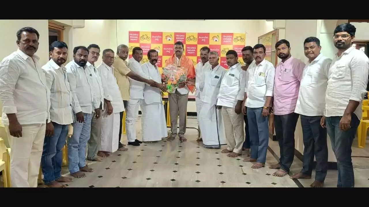 TDP district president Venkata Sivudu Yadav along with newly-elected members of WUAs