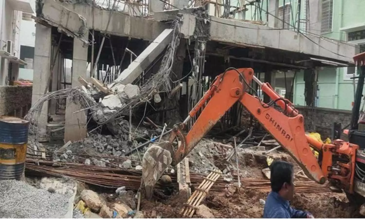 GHMC Demolishes Illegal Structures on Laxmiguda Jalpally Road for Safety