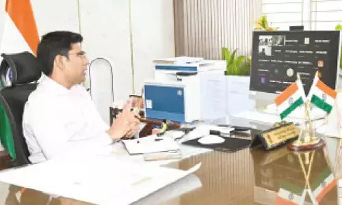 District Collector Dr S Venkateswar conducting a virtual meeting with NHAI and revenue officials in Tirupati on Tuesday