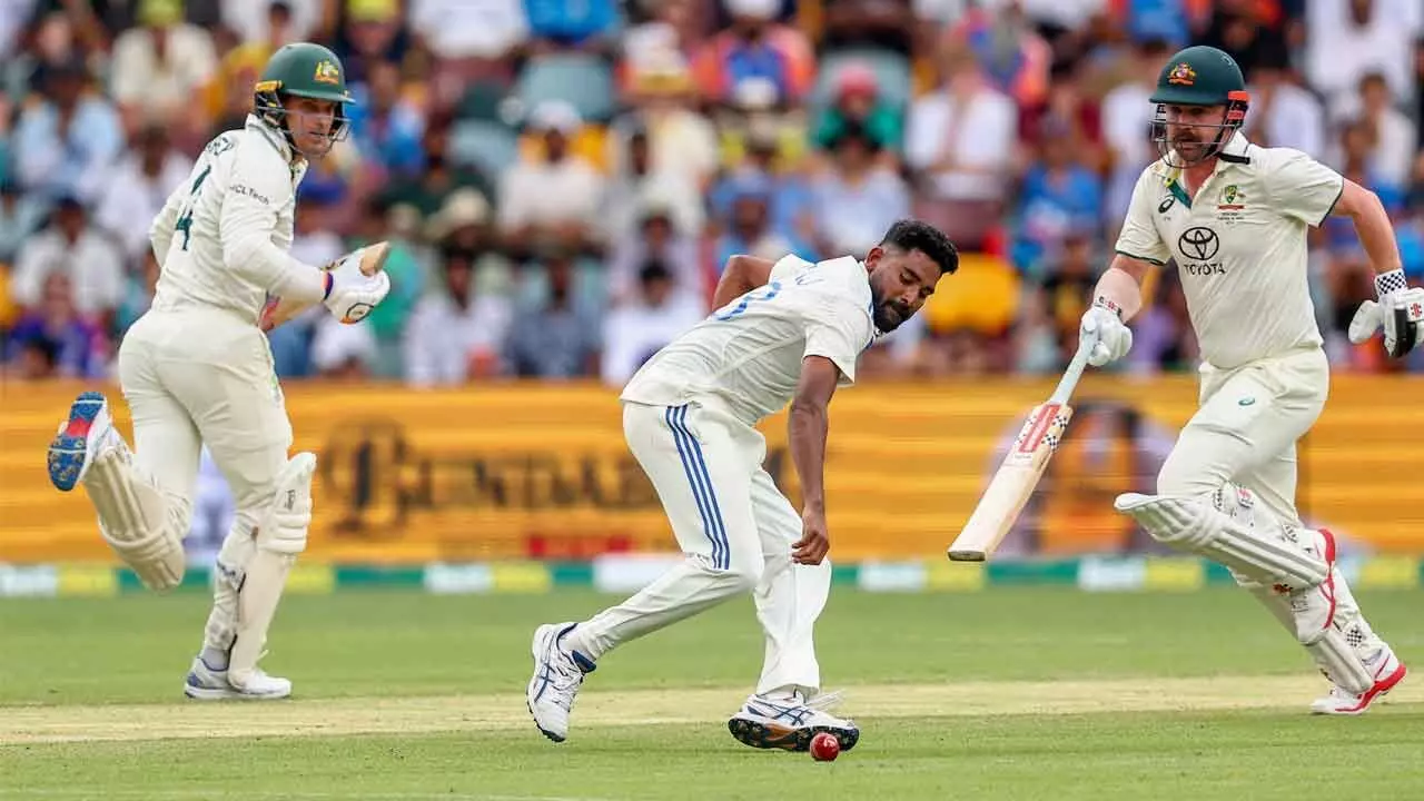 India escapes defeat