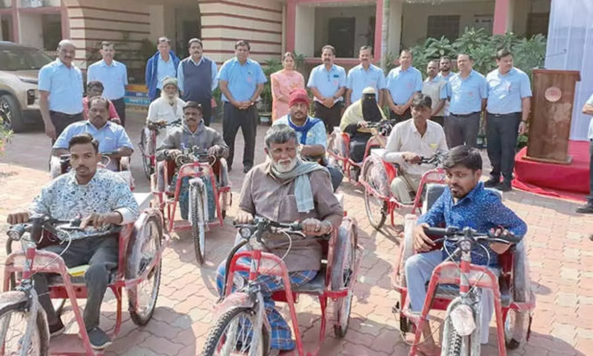 Sirpur Paper Mill distributes battery-operated tricycles