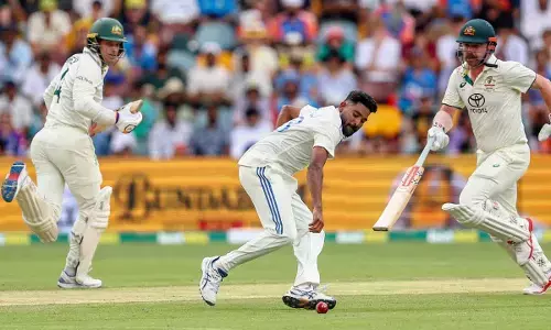 India escapes defeat