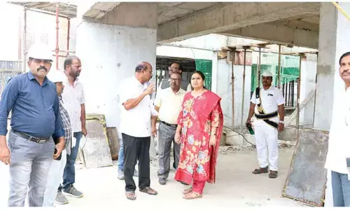 TUDA V-C inspects TUDA Towers